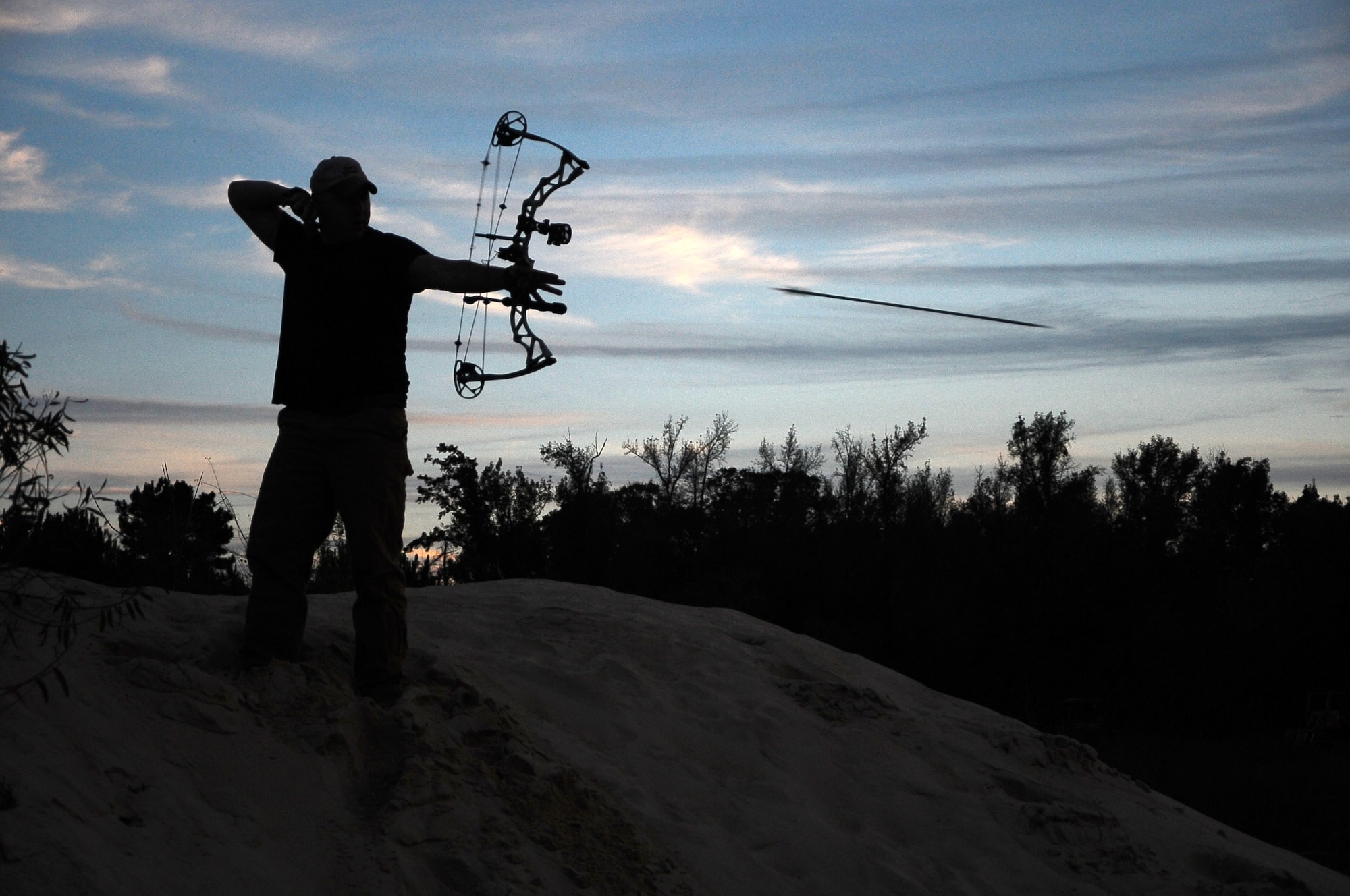 Staff Sgt. Cody Howk, 14th Operations Support Squadron, perfects his
shooting skills Nov. 5 in Columbus, Miss. Howk practices shooting so there
is no doubt when he is in a deer stand. (U.S. Air Force Photo/Airman Daniel
Lile)