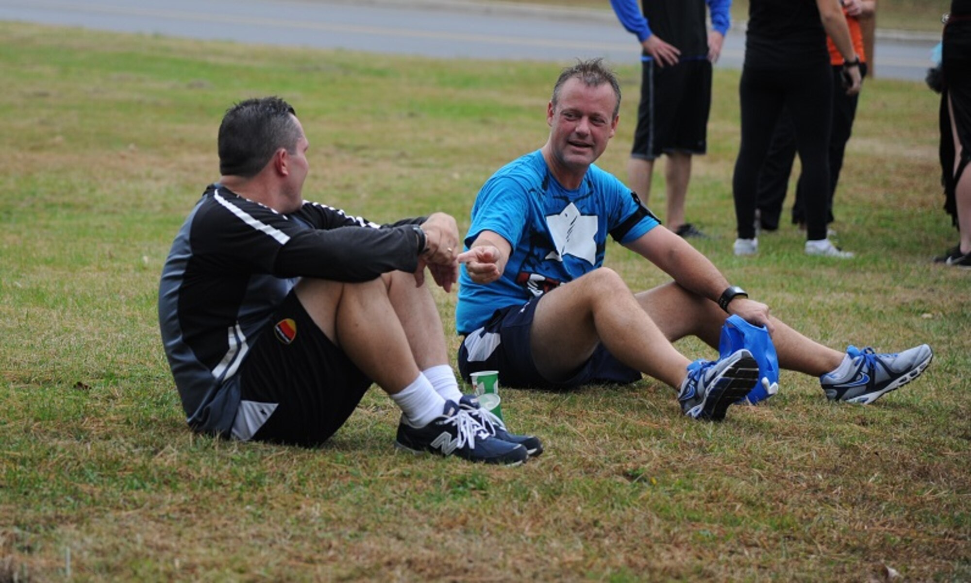 Col. James Hodges, 87th Air Base Wing, Joint Base McGuire-Dix-Lakehurst commander, catches his breath after the Freaky 5K run Oct. 31, 2013, at JB MDL, N.J. Runners dressed in Halloween costumes for the run through the woods where they were chased by volunteers who were also dressed in costumes. (U.S. Air Force photo by Airman 1st Class Sean M. Crowe/Released)