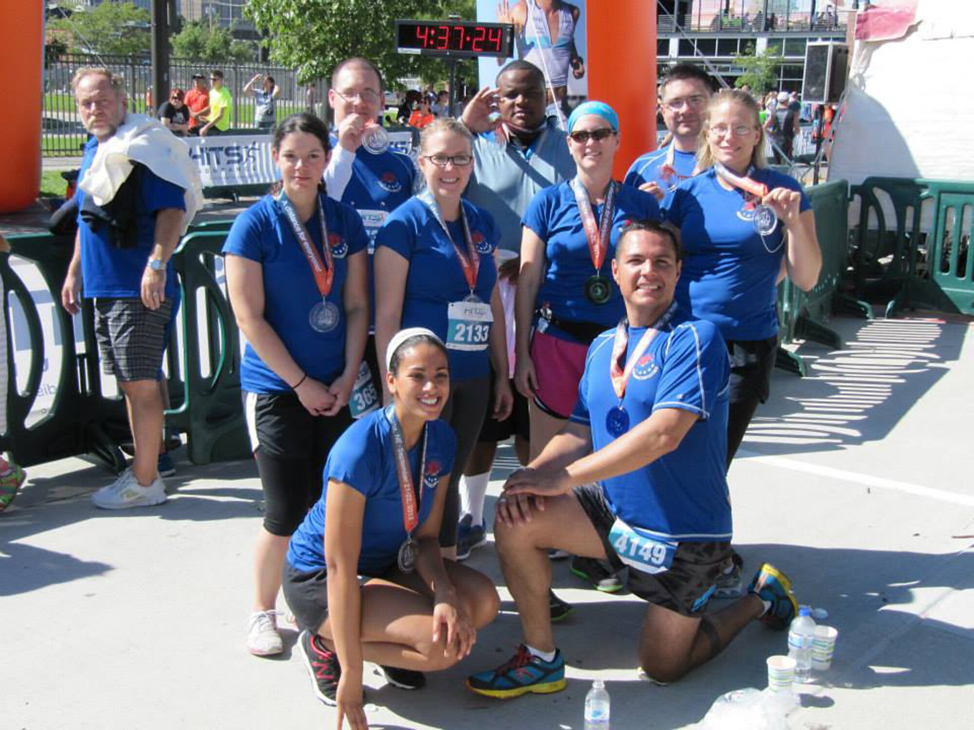 Members of the 55th Intelligence Support Squadron’s marathon team pose for a victory photo after completing the Omaha Marathon on Sept. 22, 2013 in downtown Omaha. (Courtesy Photo)