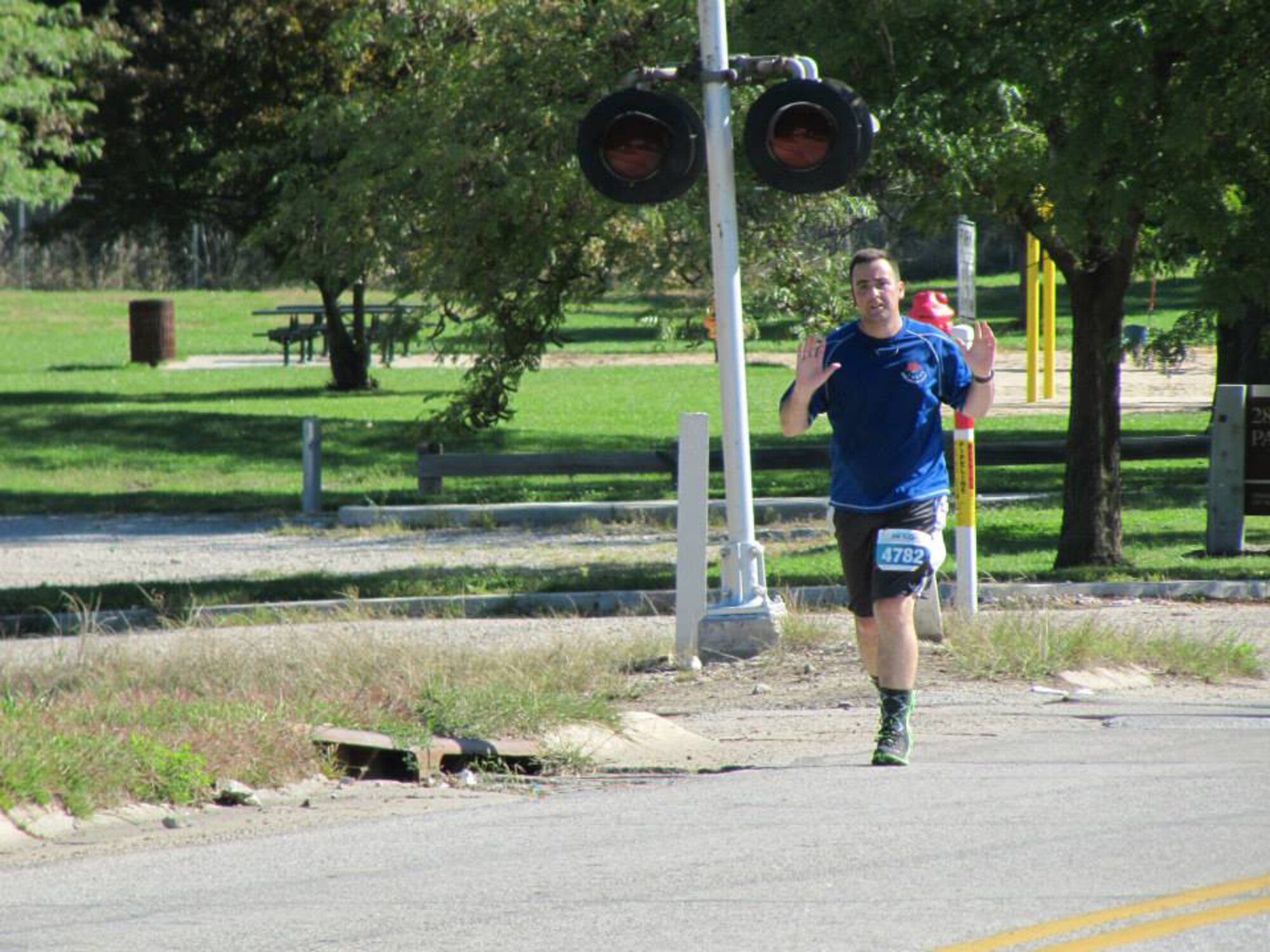 Staff Sgt. William Rozman, a 55th Intelligence Support Squadron marathon team member, runs the Omaha Marathon on Sept. 22, 2013. Rozman now organizes the running club for the 55th ISS. (Courtesy Photo)