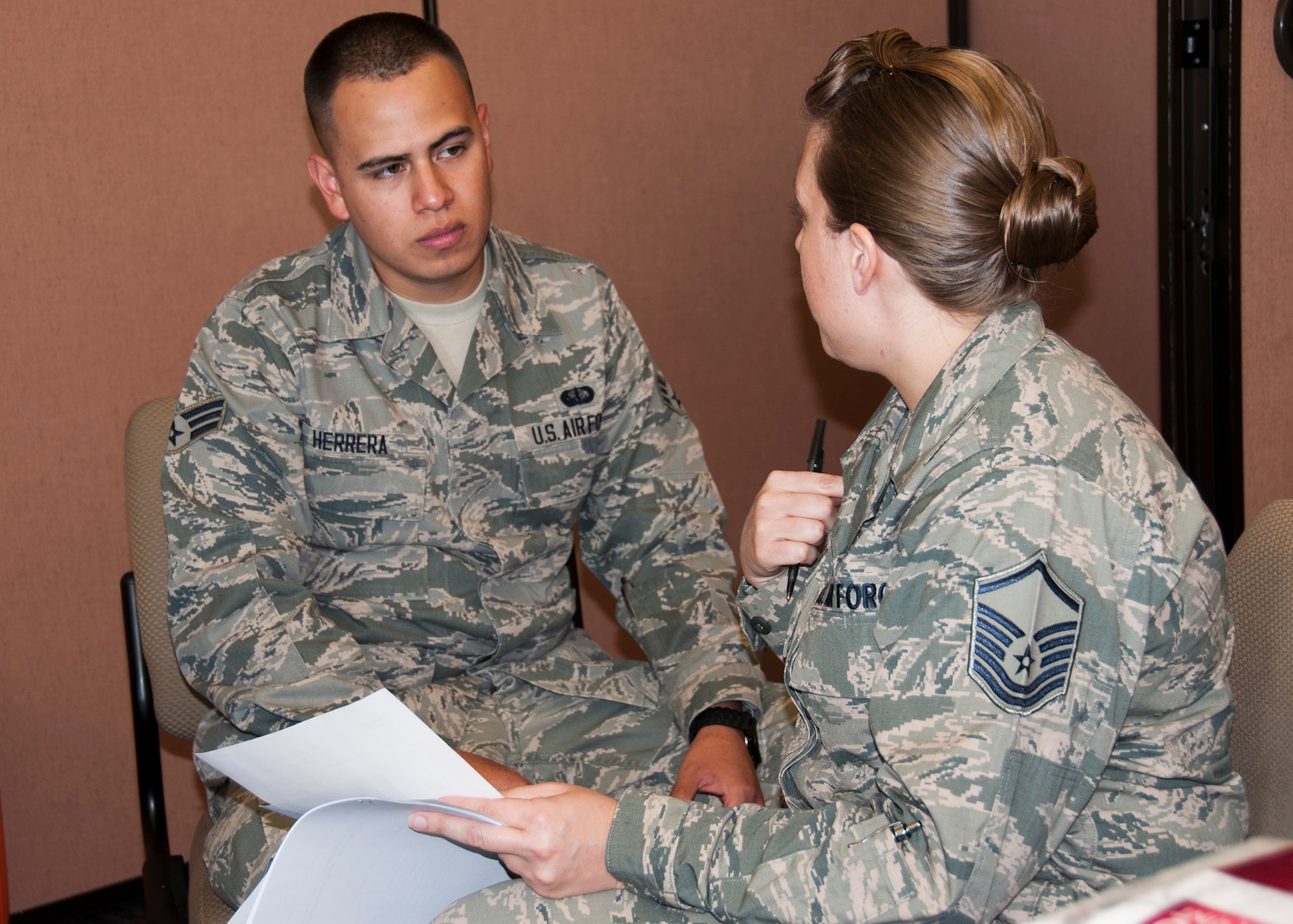 TRAVIS AIR FORCE BASE, Calif. -- Master Sergeant Andrea Johnson, medical administrator, 349th Aeromedical Evacuation Squadron, mentors Senior Airman Emmanuel Herrera, 349th Maintenance Squadron during a communication and feedback session at the Bringing on Leadership Development class held here at Travis on Nov. 1, 2013. (U.S. Aiir Force photo / Senior Airman Amelia Leonard) 