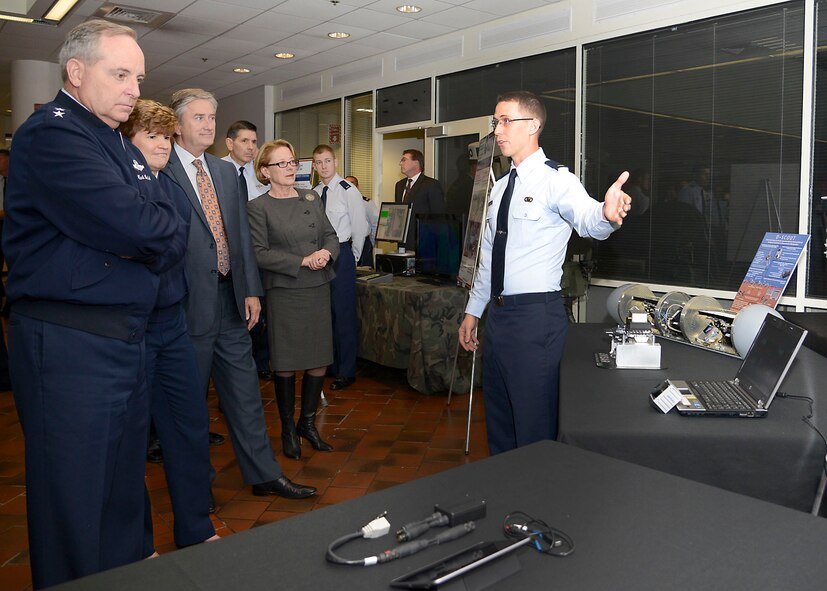 HANSCOM AFB, Mass. -- Second Lt. Thomas Wesley demonstrates counter-improvised explosive device technologies developed here to Air Force Chief of Staff Gen. Mark A. Welsh III, Gen. Janet Wolfenbarger, commander of Air Force Materiel Command, and U.S. Reps John Tierney and Niki Tsongas of Massachusetts Nov 8. (U.S. Air Force Photo By Walter Santos)