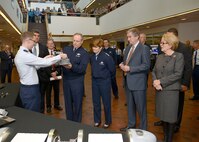 HANSCOM AFB, Mass. -- Second Lt. Thomas Wesley demonstrates counter-improvised explosive device technologies developed here to Air Force Chief of Staff Gen. Mark A. Welsh III, Gen. Janet Wolfenbarger, commander of Air Force Materiel Command, and U.S. Reps John Tierney and Niki Tsongas of Massachusetts Nov 8. (U.S. Air Force Photo By Walter Santos)