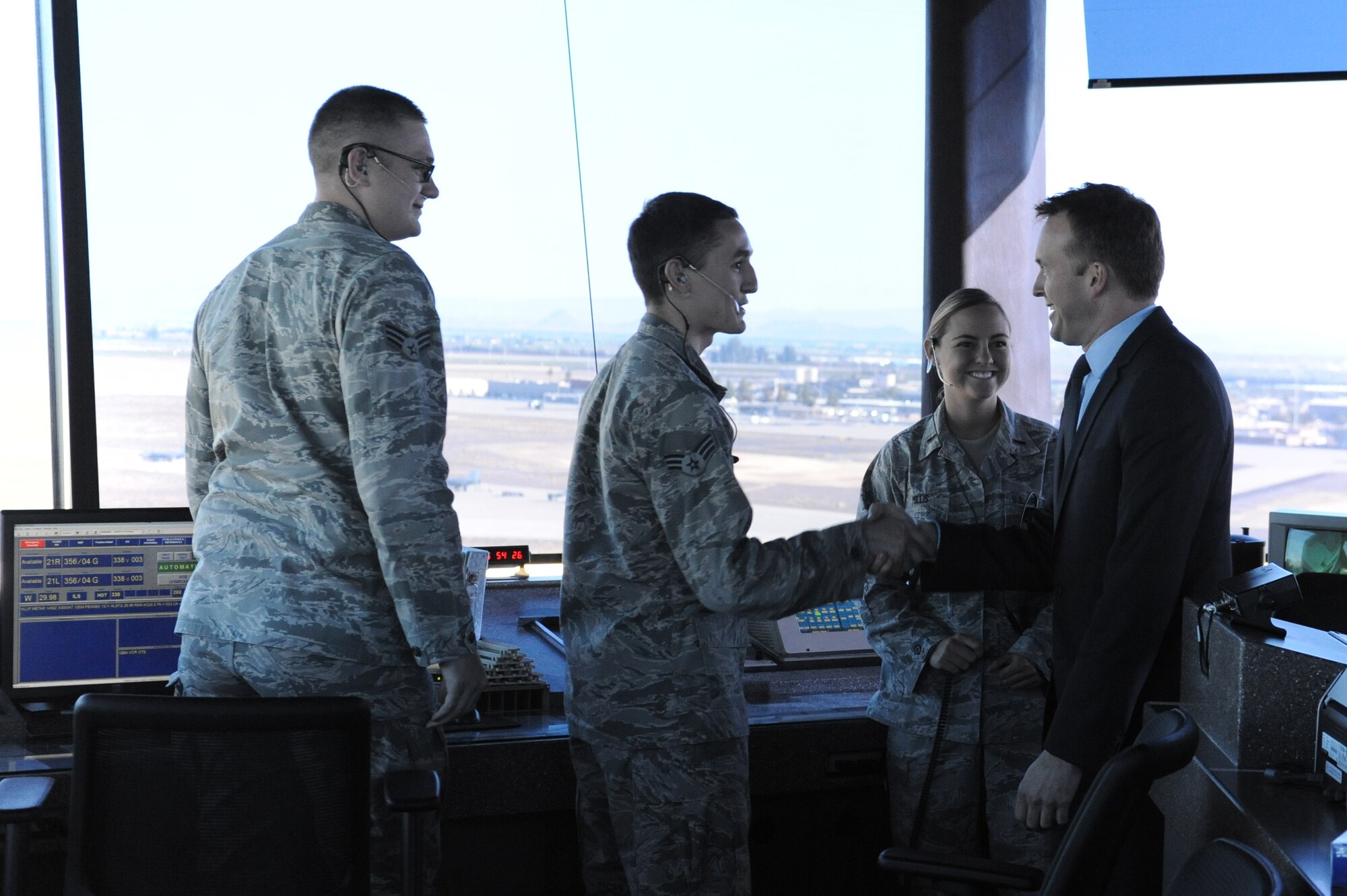 Control Tower personnel with the 56th Fighter Wing greet Acting Secretary of the Air Force Eric Fanning Nov. 5, 2013, at Luke Air Force Base, Ariz. Fanning visited with Airmen and was given an orientation to the tower. He was also briefed on construction underway to prepare for the arrival of F-35 aircraft early next year. (U.S. Air Force photo/Airman 1st Class Pedro Mota)