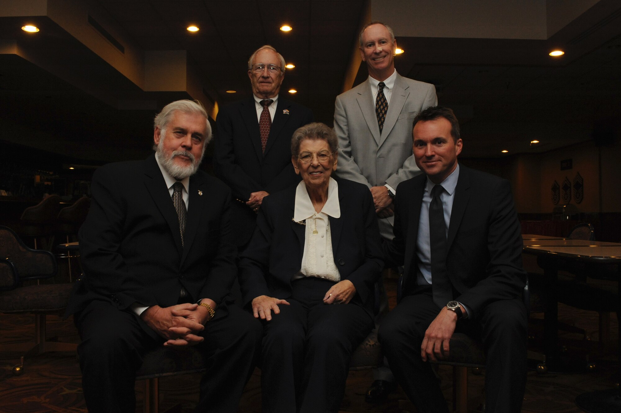 FROM LEFT: Glendale Mayor Jerry Weiers; retired Brig. Gen. Tom Browning, former 58th Fighter Wing commander from the early ‘90s; David Scholl, Fighter Country Partnership chairman of the board; and Acting Secretary of the Air Force Eric Fanning pose with Dorothy Rowe, 56th Comptroller Squadron financial analysis chief, after Rowe’s retirement ceremony Tuesday at Luke Air Force Base. Rowe is retiring after a 70-year career, making her the longest-serving civil servant in the Air Force. (U.S. Air Force photo/Airman 1st Class Pedro Mota)