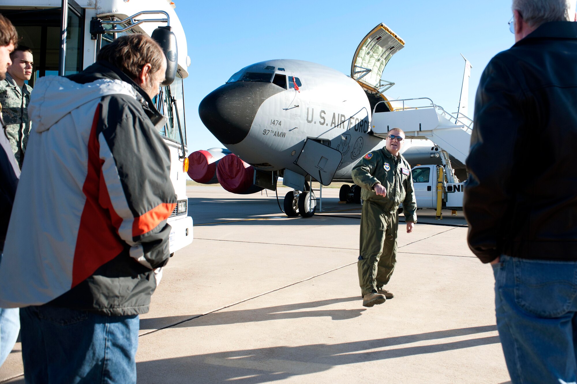 ALTUS AIR FORCE BASE, Okla. – U.S. Air Force Capt. Peter Robinson, 54th Air Refueling Squadron instructor pilot, gives a tour of a U.S. Air Force KC-135 Stratotanker refueling aircraft to members of the Altus community during the Farm City Week tour Nov. 7, 2013. Altus community members received a wing mission brief, visits to various base agencies and a tour inside a U.S. Air Force C-17 Globemaster III cargo aircraft and a KC-135 aircraft. (U.S. Air Force photo by Senior Airman Jesse Lopez/Released)
