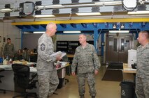 YOUNGSTOWN AIR RESERVE STATION, Ohio -- 22nd Air Force Command Chief Master Sgt. Steven Larwood speaks with members of the 910th Avionics Flight about changes to Reserve forces and offers encouragement to press on through those changes here, Nov. 2, 2013. Larwood’s visited YARS for the fourth time (U.S. Air Force photo // Senior Airman Rachel Kocin)