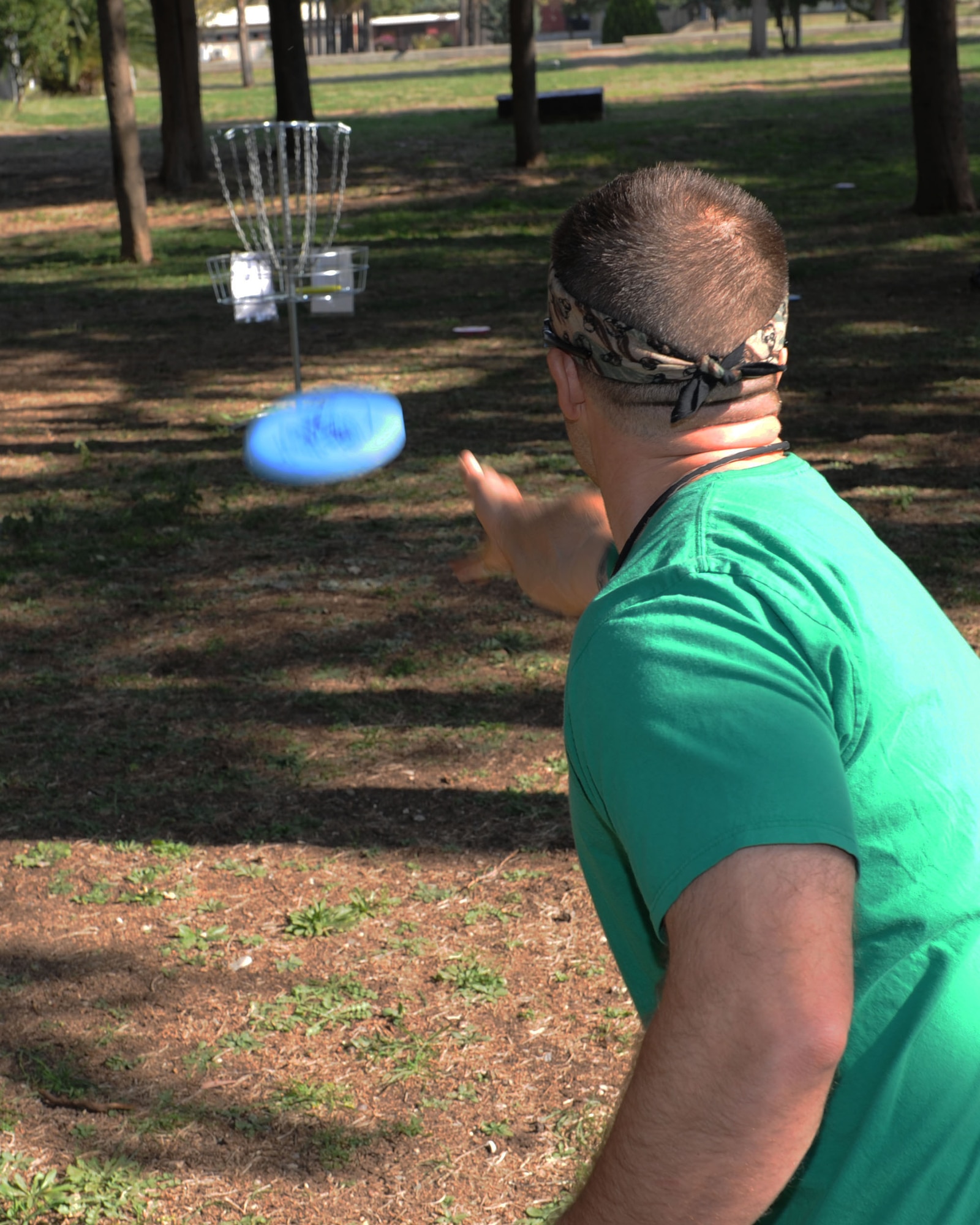 Master Sgt. Dave Fitzgerald, 39th Civil Engineer Squadron explosive ordinance disposal superintendant, throws a disc during a disc golf clinic event Nov. 2, 2013, on Incirlik Air Base, Turkey. Discs and maps of the course can be checked out for free from the 39th Force Support Squadron outdoor recreation to those interested in trying out the sport. (U.S. Air Force photo by Senior Airman Chase Hedrick/Released)