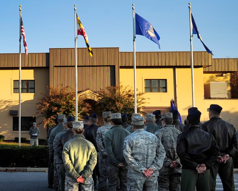 Airmen from the 89th Airlift Wing stand in formation as Col. David Almand, 89th Airlift Wing commander speaks about honoring our veterans this holiday at Joint Base Andrews, Md., Nov. 8. More than 175 Airmen gathered in formation for the ceremony. (U.S. Air Force photo/Senior Airman Lauren Main)