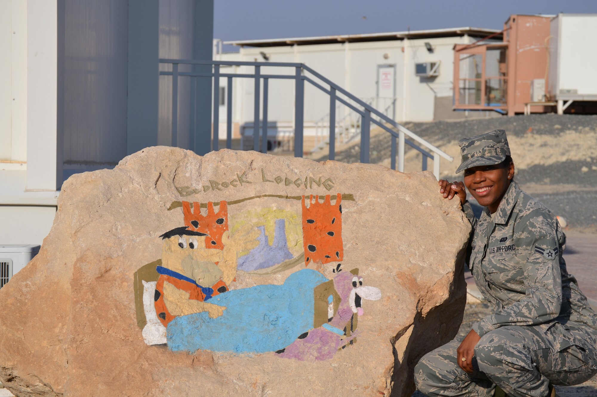 Airman 1st Class Theda Shaw is a front desk lodging clerk at the 386th Expeditionary Force Support Squadron, undisclosed location, Southwest Asia.  She assists in sustaining deployed Airmen by feeding, lodging, counting, educating and entertaining them.  Shaw who is on her first deployment has been selected by her leadership as this week's Rock Solid Warrior.  (U.S. photo by Master Sgt. Marelise Wood)