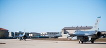 Three F-16 Fighting Falcons from the 8th Fighter Wing taxi to participate in their final Max Thunder sortie at Kunsan Air Base, Republic of Korea, Nov. 7, 2013. Airmen from the U.S. Air Force, Marine Corps and the Republic of Korea air force continued their participation in scenarios and planning cycles in a robust exercise setting that simulated combined operations against a hostile force, Nov. 7, 2013. This combined large-force employment exercise includes 8th Fighter Wing F-16 Fighting Falcons, 51st Fighter Wing A-10 Thunderbolts II and F-16s, Marine Air Group 12 F-18 Hornets, AV-8B Harriers II, 35th Air Defense Artillery Brigade, 18th Wing E-3B Sentries, numerous ROKAF aircraft and accompanying support personnel.  (U.S. Air Force photo by Senior Airman Armando A. Schwier-Morales/Released)