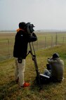 Media gathers near the flight line to document an 8th Fighter Wing F-16 Fighting Falcon take-off during the Max Thunder exercise at Kunsan Air Base, Republic of Korea, Nov. 6, 2013. Hosting members of the international media community enhances a global understanding and awareness of exercises like Max Thunder that demonstrate joint service capabilities. (U.S. Air Force photo by Staff Sgt. Jessica Haas/Released)