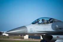 An 8th Fighter Wing F-16 Fighting Falcon taxis towards the runway before taking off for the final sortie of Max Thunder at Kunsan Air Base, Republic of Korea, Nov. 7, 2013. Airmen from the U.S. Air Force, Marine Corps and the Republic of Korea air force continued their participation in scenarios and planning cycles in a robust exercise setting that simulated combined operations against a hostile force, Nov. 7, 2013. This combined large-force employment exercise includes 8th Fighter Wing F-16 Fighting Falcons, 51st Fighter Wing A-10 Thunderbolts II and F-16s, Marine Air Group 12 F-18 Hornets, AV-8B Harriers II, 35th Air Defense Artillery Brigade, 18th Wing E-3B Sentries, numerous ROKAF aircraft and accompanying support personnel during.  (U.S. Air Force photo by Senior Airman Armando A. Schwier-Morales/Released)