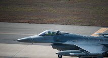 An 8th Fighter Wing F-16 Fighting Falcon taxis to take off for a Max Thunder flight at Kunsan Air Base, Republic of Korea, Nov. 5, 2013. Airmen from the U.S. Air Force, Marine Corps and the Republic of Korea air force continued their participation in scenarios and planning cycles in a robust exercise setting that simulated combined operations against a hostile force, Nov. 5, 2013. This combined large-force employment exercise includes 8th Fighter Wing F-16 Fighting Falcons, 51st Fighter Wing A-10 Thunderbolts II and F-16s, Marine Air Group 12 F-18 Hornets, AV-8B Harriers II, 35th Air Defense Artillery Brigade, 18th Wing E-3B Sentries, numerous ROKAF aircraft and accompanying support personnel. (U.S. Air Force photo by Senior Airman Armando A. Schwier-Morales/Released)