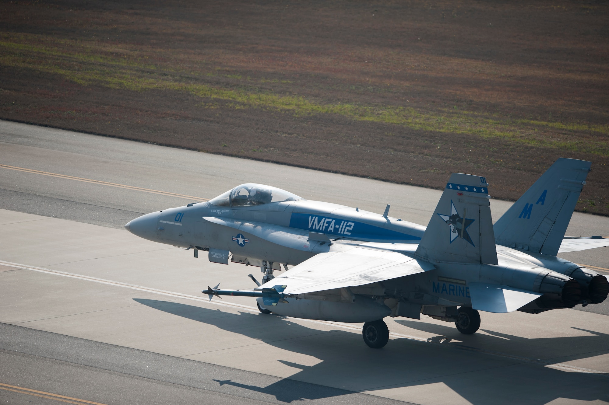 An F-18 Hornet from the Marine Fighter Attack Squadron 112, taxis after completing a Max Thunder flight at Kunsan Air Base, Republic of Korea, Nov. 5, 2013. Airmen from the U.S. Air Force, Marine Corps and the Republic of Korea air force continued their participation in scenarios and planning cycles in a robust exercise setting that simulated combined operations against a hostile force, Nov. 5, 2013. This combined large-force employment exercise includes 8th Fighter Wing F-16 Fighting Falcons, 51st Fighter Wing A-10 Thunderbolts II and F-16s, Marine Air Group 12 F-18 Hornets, AV-8B Harriers II, 35th Air Defense Artillery Brigade, 18th Wing E-3B Sentries, numerous ROKAF aircraft and accompanying support personnel. (U.S. Air Force photo by Senior Airman Armando A. Schwier-Morales/Released)