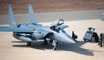 Republic of Korea airmen prepare an F-15 Slam Eagle for a Max Thunder sortie at Kunsan Air Base, Republic of Korea, Nov. 5, 2013. Airmen from the U.S. Air Force, Marine Corps and the Republic of Korea air force continued their participation in scenarios and planning cycles in a robust exercise setting that simulated combined operations against a hostile force, Nov. 5, 2013. This combined large-force employment exercise includes 8th Fighter Wing F-16 Fighting Falcons, 51st Fighter Wing A-10 Thunderbolts II and F-16s, Marine Air Group 12 F-18 Hornets, AV-8B Harriers II, 35th Air Defense Artillery Brigade, 18th Wing E-3B Sentries, numerous ROKAF aircraft and accompanying support personnel. (U.S. Air Force photo by Senior Airman Armando A. Schwier-Morales/Released)