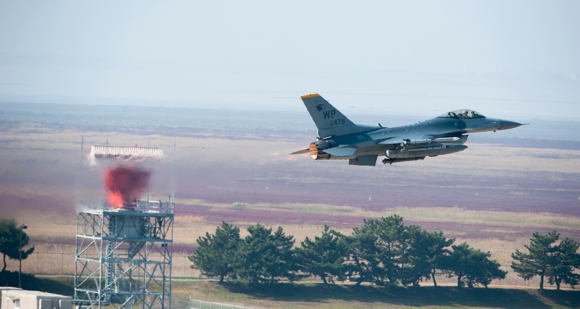 An 80th Fighter Squadron F-16 Fighting Falcon takes off for a Max Thunder sortie at Kunsan Air Base, Republic of Korea, Nov. 5, 2013. Airmen from the U.S. Air Force, Marine Corps and the Republic of Korea air force continued their participation in scenarios and planning cycles in a robust exercise setting that simulated combined operations against a hostile force, Nov. 5, 2013. This combined large-force employment exercise includes 8th Fighter Wing F-16 Fighting Falcons, 51st Fighter Wing A-10 Thunderbolts II and F-16s, Marine Air Group 12 F-18 Hornets, AV-8B Harriers II, 35th Air Defense Artillery Brigade, 18th Wing E-3B Sentries, numerous ROKAF aircraft and accompanying support personnel. (U.S. Air Force photo by Senior Airman Armando A. Schwier-Morales/Released)