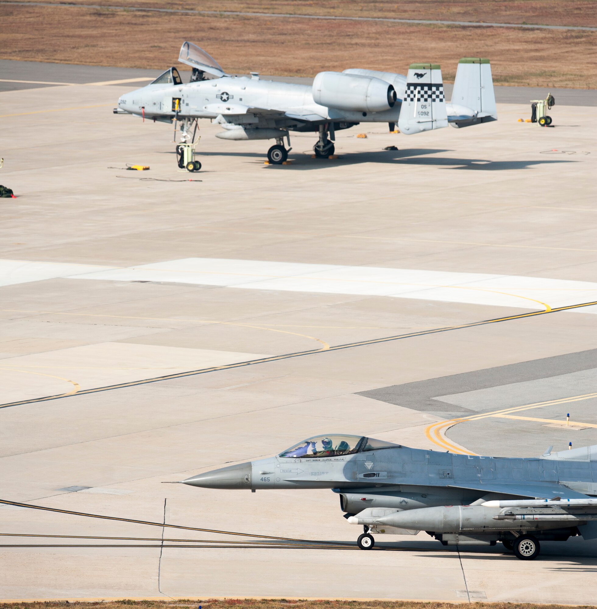 An 8th Fighter Wing F-16 Fighting Falcon taxis to take off for a Max Thunder flight at Kunsan Air Base, Republic of Korea, Nov. 5, 2013. Airmen from the U.S. Air Force, Marine Corps and the Republic of Korea air force continued their participation in scenarios and planning cycles in a robust exercise setting that simulated combined operations against a hostile force, Nov. 5, 2013. This combined large-force employment exercise includes 8th Fighter Wing F-16 Fighting Falcons, 51st Fighter Wing A-10 Thunderbolts II and F-16s, Marine Air Group 12 F-18 Hornets, AV-8B Harriers II, 35th Air Defense Artillery Brigade, 18th Wing E-3B Sentries, numerous ROKAF aircraft and accompanying support personnel. (U.S. Air Force photo by Senior Airman Armando A. Schwier-Morales/Released)