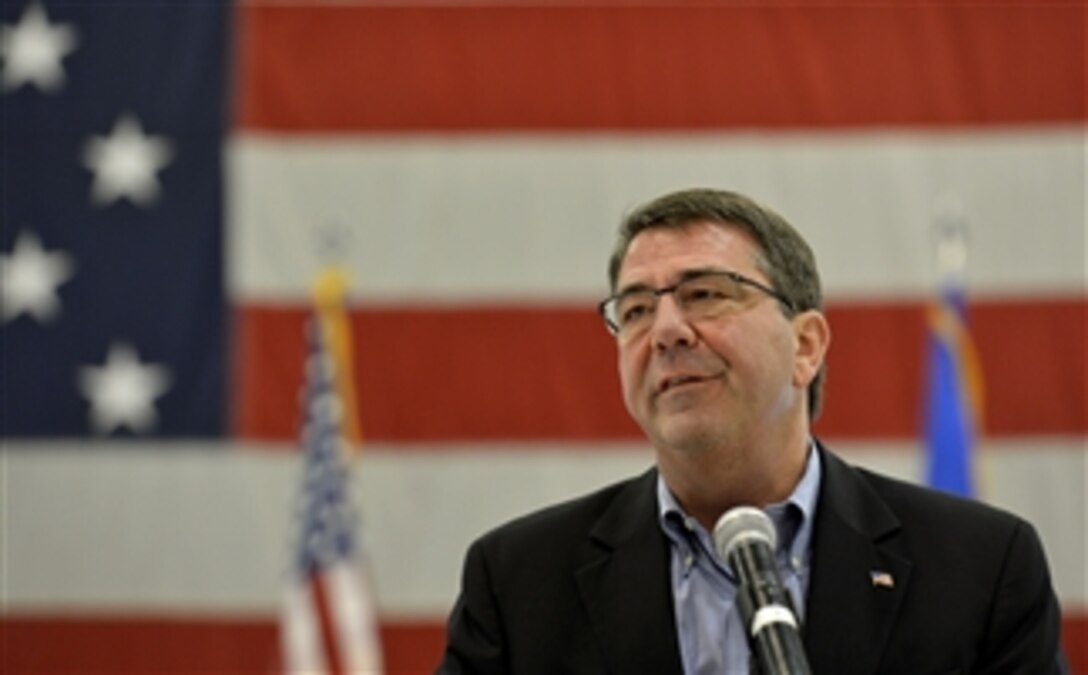 Deputy Secretary of Defense Ashton B. Carter talks to a group of military and civilian Air Force personnel of the 388th Fighter Wing in a hangar at Hill Air Force Base in Ogden, Utah, on Nov. 5, 2013.  