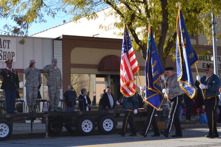 BELLEVUE, Neb. (Nov. 9, 2013) U.S. Strategic Command (USSTRATCOM) senior enlisted leader Command Sergeant Major Patrick Z. Alston, far left, salutes a Veterans of Foreign Wars marching group at the 14th annual Bellevue Veterans Day Parade.\r\nUSSTRATCOM provided a marching group comprised of more than 60 personnel representing the U.S. Army, Navy, Air Force, and Marine Corps. Along with USSTRATCOM, elements from the 55th Wing, Air Force Weather Agency, Bellevue schools, local businesses and special interest groups came together to thank veterans, past and present, for their service to our nation. (U.S. Navy photo by Mass Communication Specialist 1st Class Byron C. Linder/Released)