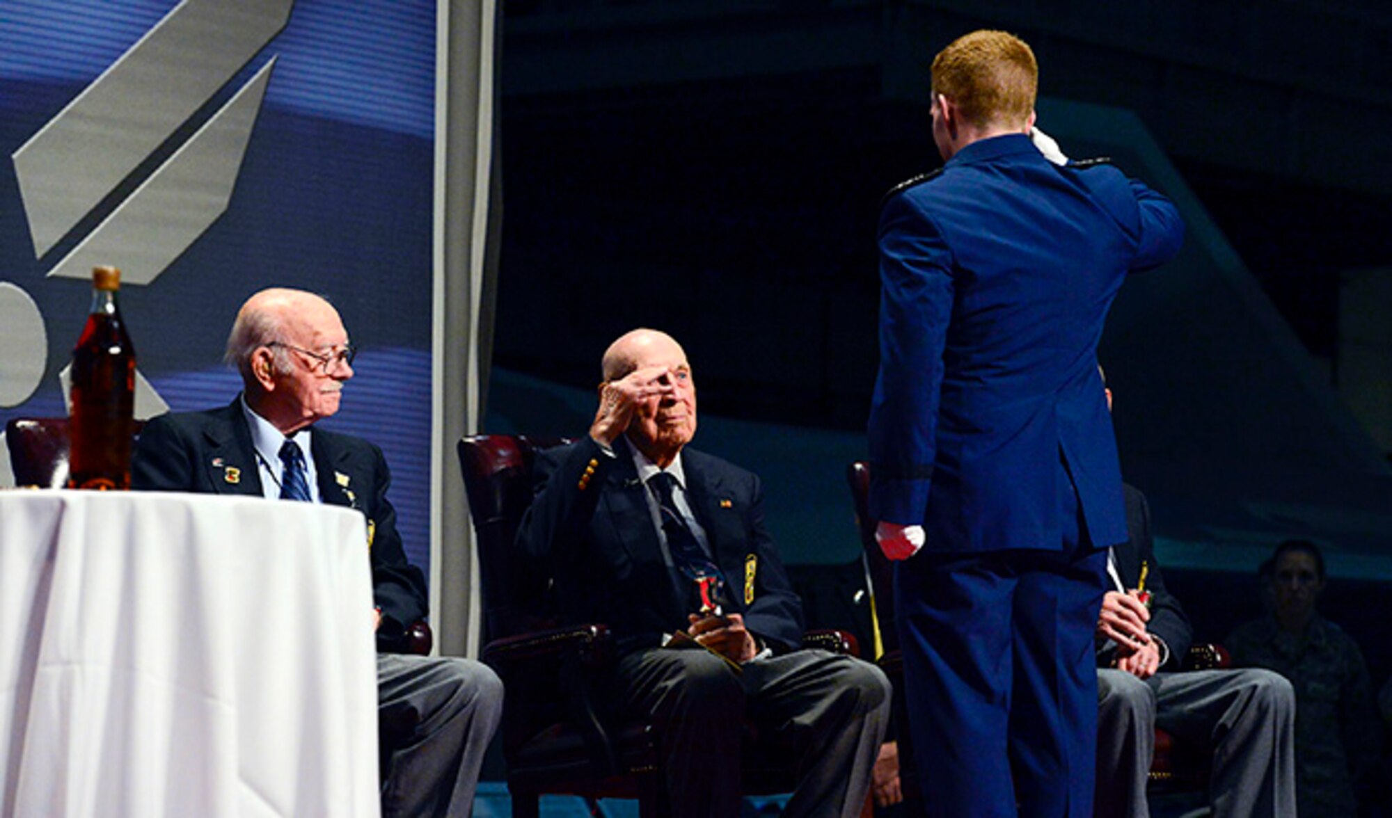 Air Force Academy cadets hand out a goblet to each Raider with their name on it during The Doolittle Raiders final toast at the National Museum of the U.S. Air Force Nov. 09, 2013 in Dayton, Ohio. 