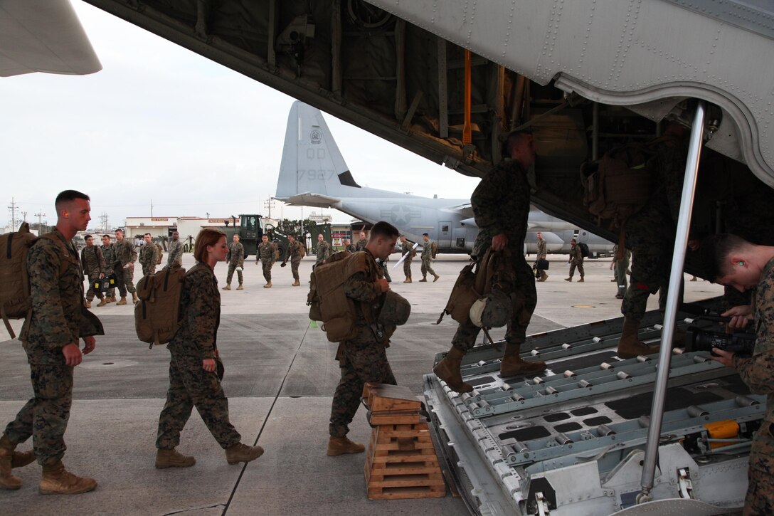 Marines board a KC-130J Hercules aircraft Nov. 10 at Marine Corps Air Station Futenma, Okinawa, Japan, moments before departing for a humanitarian assistance and disaster relief mission to the Philippines. Typhoon Haiyan has impacted more than 4.2 million people across 36 provinces in the Philippines, according to the Philippine government’s national disaster risk reduction and management council. Since 1990, the U.S. Government has responded to more than 40 disasters in the Philippines at the request of that country’s government, ranging from volcanic eruptions, drought, and population displacement. MCAS Futenma is a mission ready air station capable of continuous aviation and base operating support for tenant organizations and follow-on U.S., Allied, and United Nations forces during combat or contingency operations in the Western Pacific Theater of operations, to include U.S. Pacific Command, Marine Corps Forces Pacific and Marine Corps Installations Pacific.