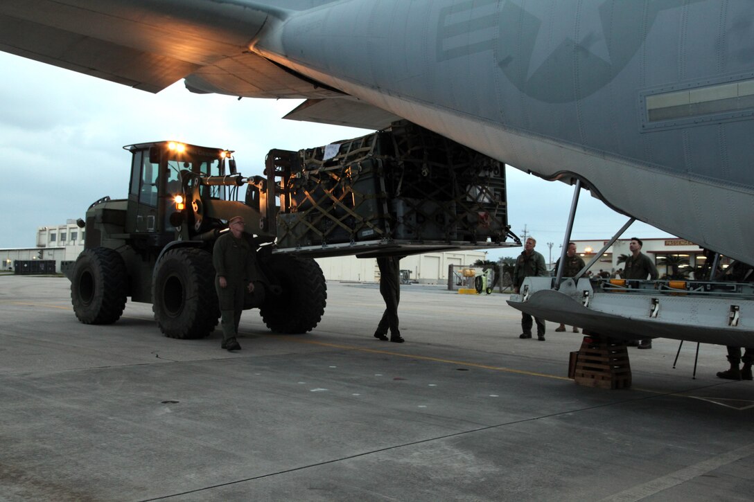 Marines load palletized equipment onto a KC-130J Hercules aircraft Nov. 11 at Marine Corps Air Station Futenma, Okinawa, Japan, during preparation for a humanitarian assistance and disaster relief mission to the Philippines. Super Typhoon Haiyan has impacted more than 4.2 million people across 36 provinces in the Philippines, according to the Philippine government’s national disaster risk reduction and management council. Philippine officials will have a better idea of the damage and death toll in the coming days as transportation and communications systems are repaired. 
(U.S. Marine Corps photo by Lance Cpl. David N. Hersey/Released)
