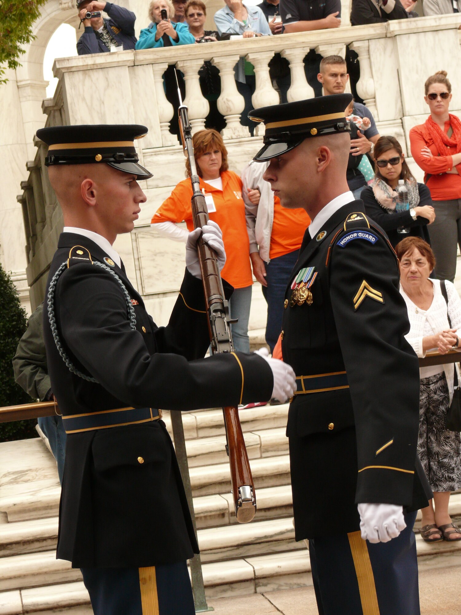 Vice Chairman of the Southern Middle Tennessee Honor Flight, Lana Woodard (middle left), witnesses The Changing of the Guard at the Tomb of the Unknowns at Arlington National Cemetery.  Forty-eight World War II and Korean War veterans participated in the trip.