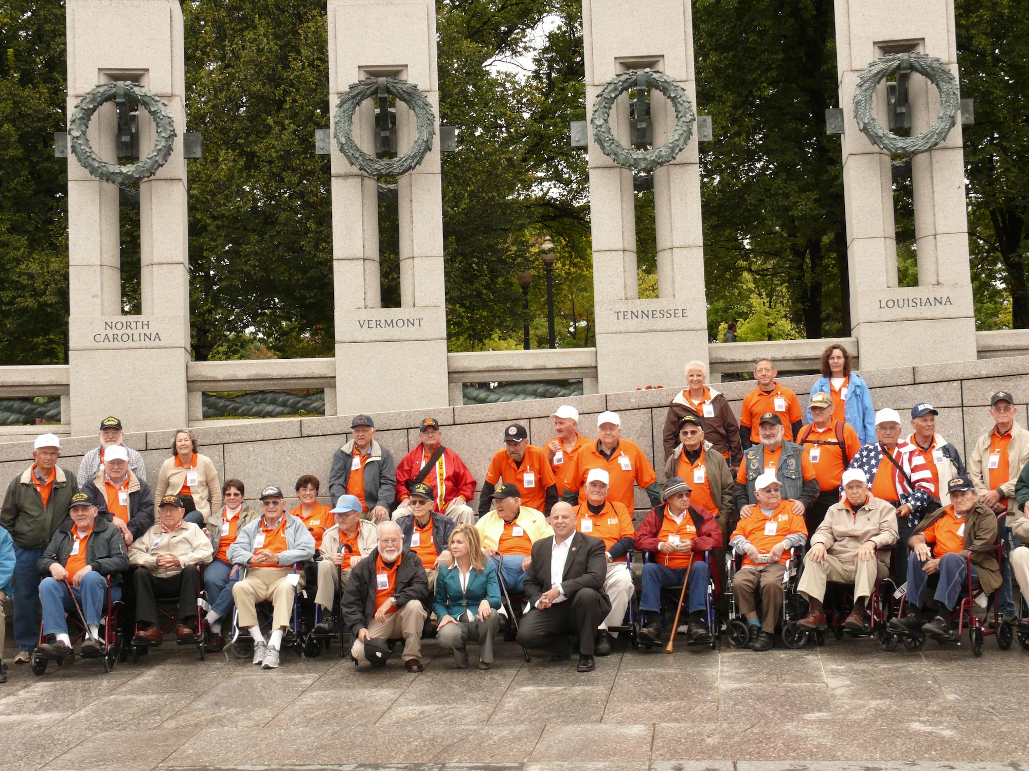 The Southern Middle Tennessee Honor Flight veterans group with Reps. Marsha Blackburn (first row, middle) and Scott DesJarlais (first row, right) take a moment to document the veterans’ trip with a photo at the World War II Memorial.  The Arnold Community Council, a support group for AEDC, is a sponsor of the Honor Flight.