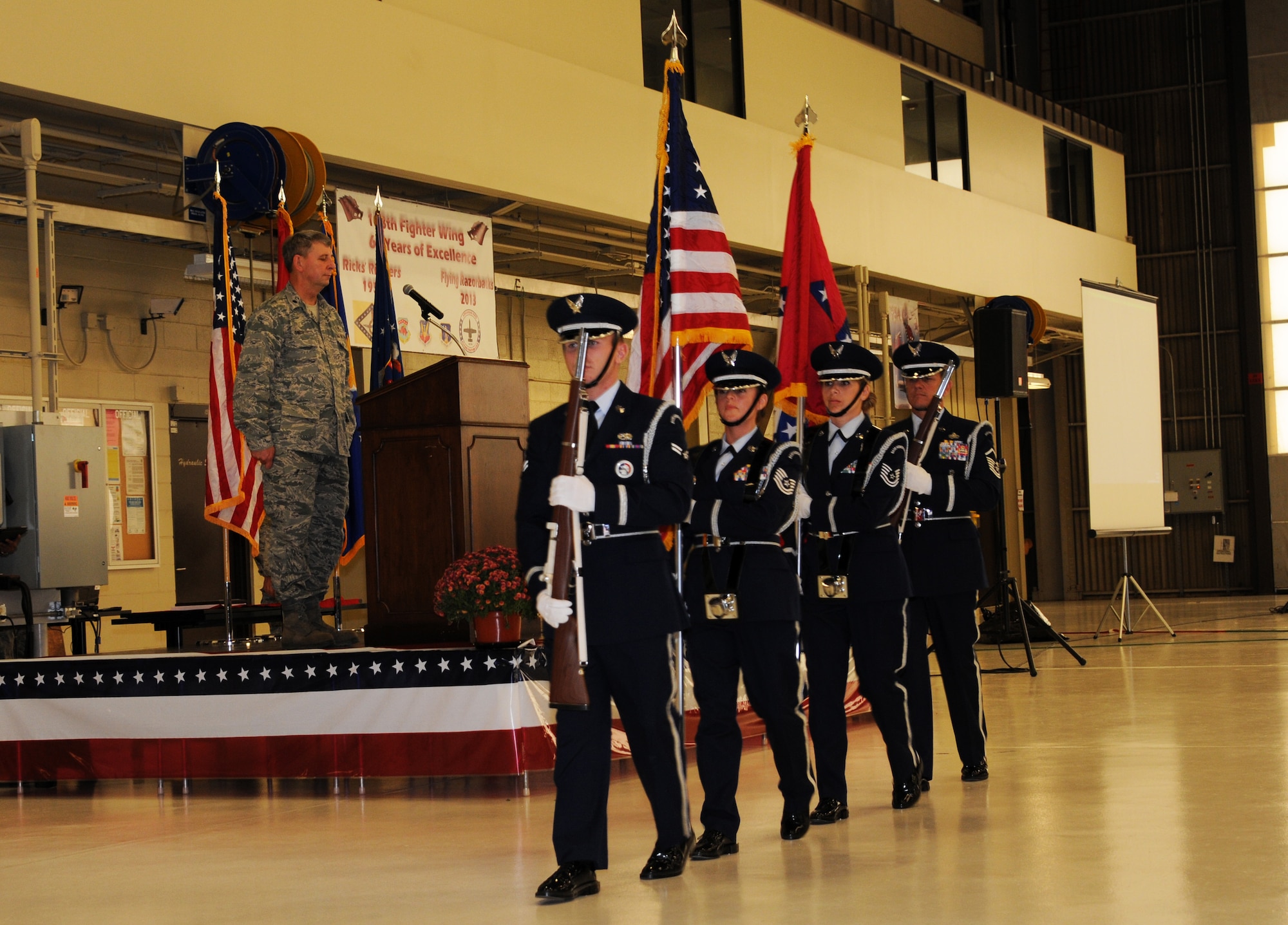 Members of the 188th Fighter Wing Honor Guard advance the colors during the 188th’s 60th anniversary jubilee Nov. 2, 2013, held at the unit’s Ebbing Air National Guard Base, Fort Smith, Ark. The 188th hosted the event in its main hangar to celebrate 60 years of excellence. The 188th marked 60 years as an Air National Guard unit Oct. 15. The unit began as the 184th Tactical Reconnaissance Squadron in 1953. More than 1,000 people attended the event. (U.S. Air National Guard photo by Airman 1st Class Cody Martin/188th Fighter Wing Public Affairs)
