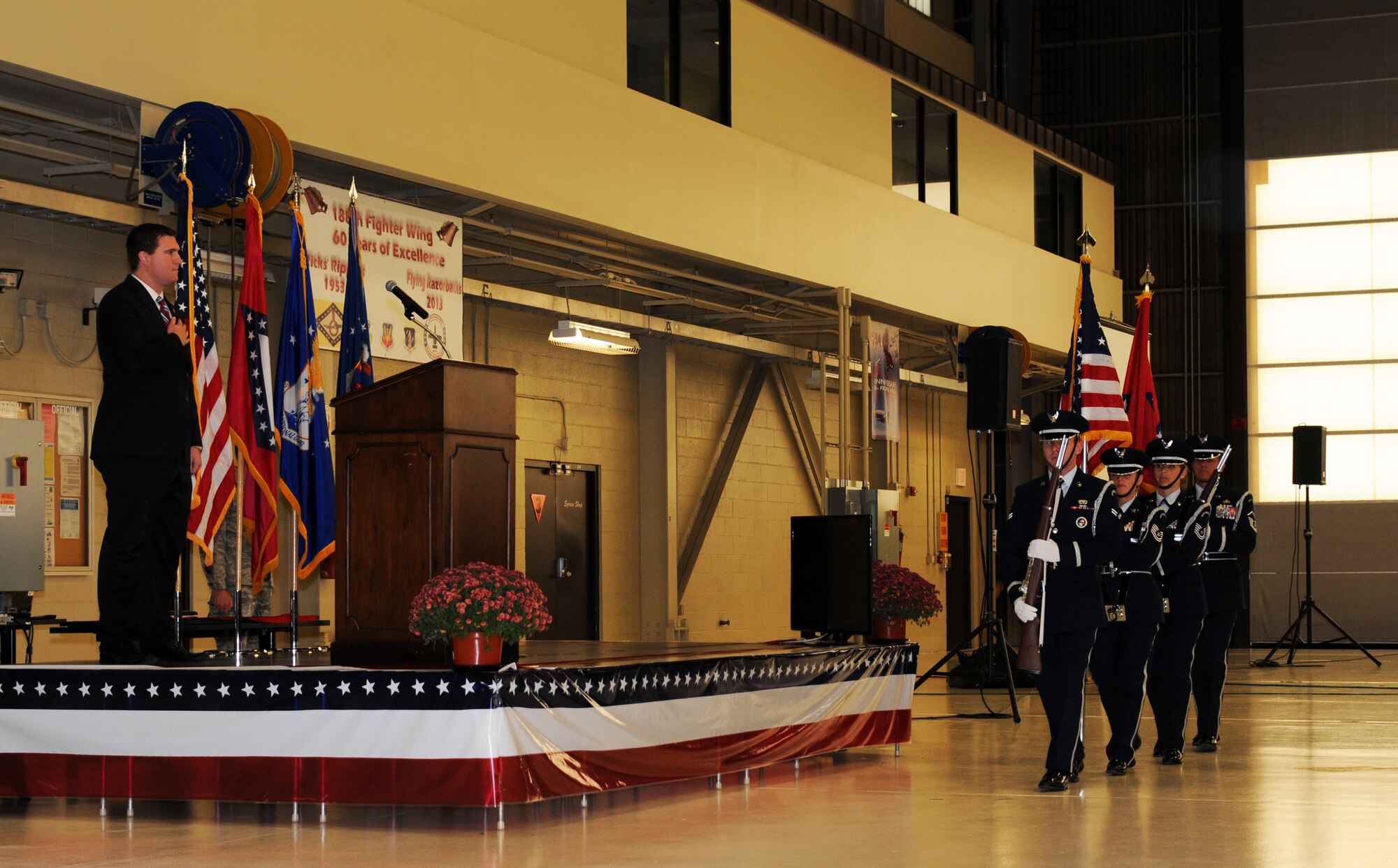 Members of the 188th Fighter Wing Honor Guard advance the colors during the 188th’s 60th anniversary jubilee Nov. 2, 2013, held at the unit’s Ebbing Air National Guard Base, Fort Smith, Ark. The 188th hosted the event in its main hangar to celebrate 60 years of excellence. The 188th marked 60 years as an Air National Guard unit Oct. 15. The unit began as the 184th Tactical Reconnaissance Squadron in 1953. More than 1,000 people attended the event. (U.S. Air National Guard photo by Airman 1st Class Cody Martin/188th Fighter Wing Public Affairs)