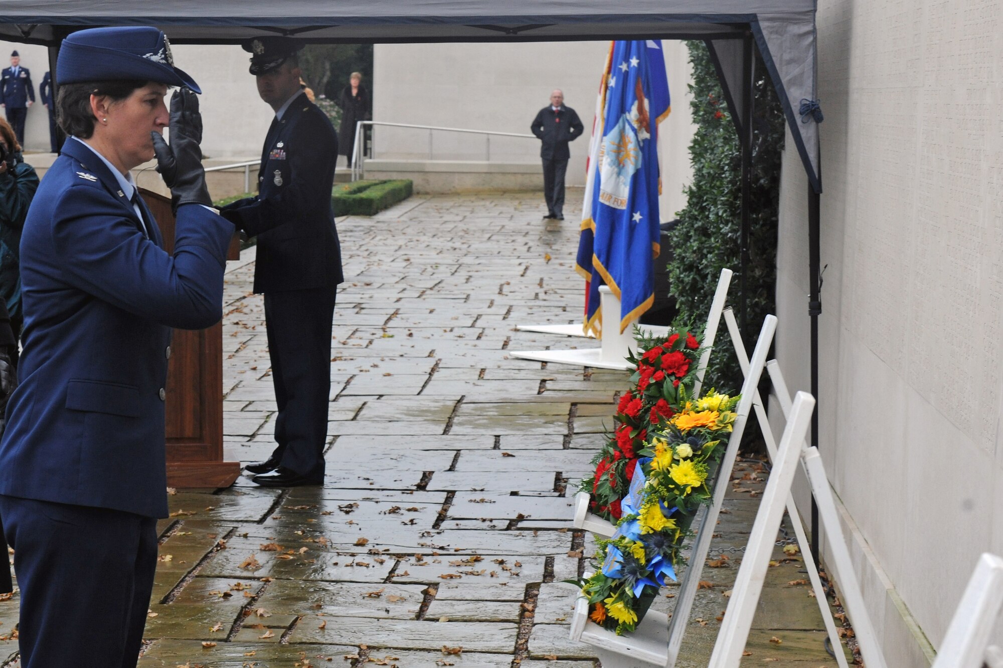 CAMBRIDGE, United Kingdom – Col. Angela Cadwell, 501st Combat Support Wing commander, saluted the wreath she laid at the base of the Tablets of the Missing in Cambridge American Cemetery, in Cambridge, United Kingdom, Nov. 11 during a Veterans Day ceremony. The ceremony honored the veterans of both the United States and United Kingdom. (U.S. Air Force photo by Staff Sgt. Brian Stives)