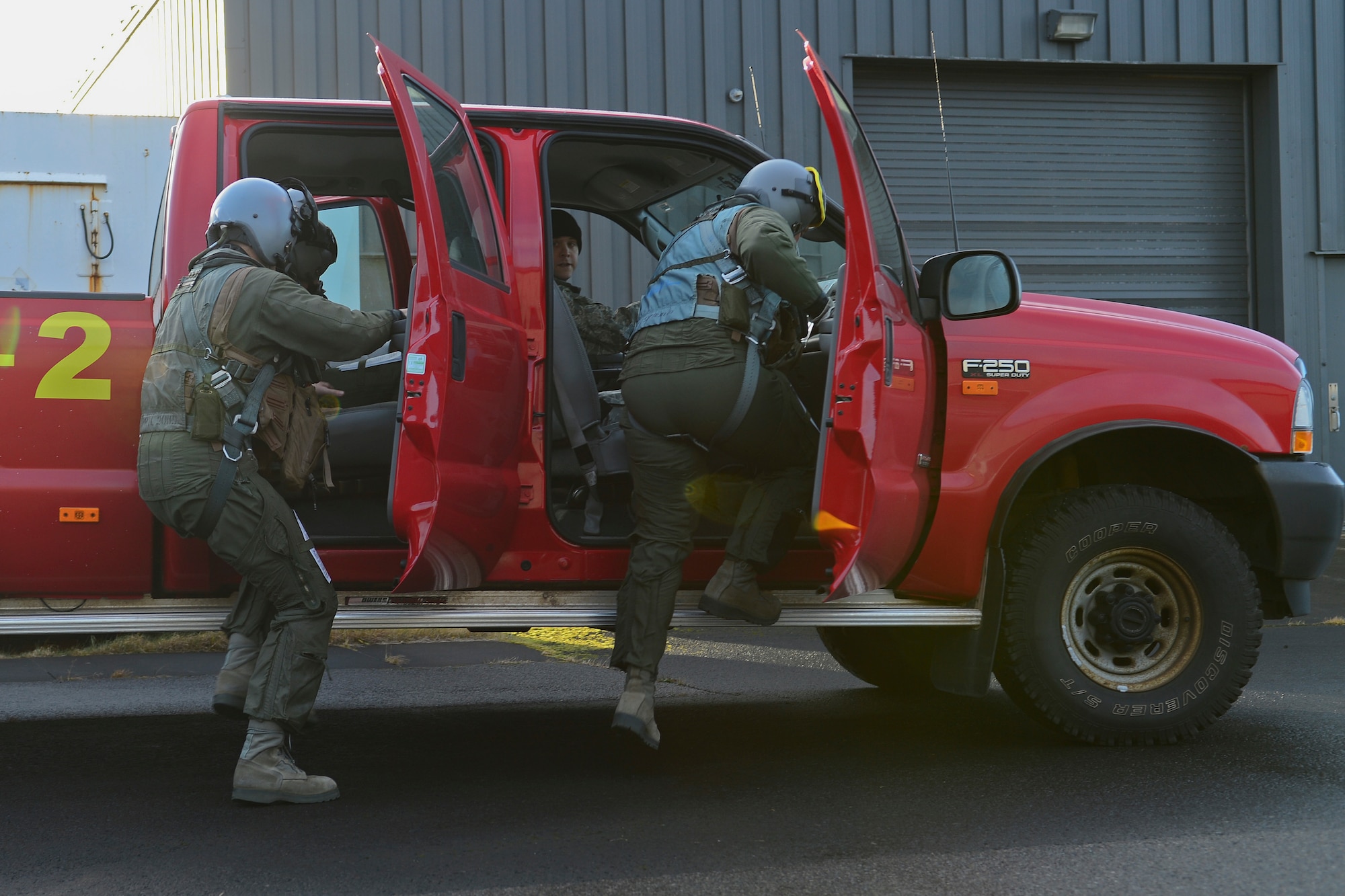 Lt. Col. Mark Sadler, 493rd Expeditionary Fighter Squadron commander and Capt. Garth Wolber, 493rd EFS pilot, scramble to an F-15C Eagle at Keflavik International Airport, Iceland, Nov. 7, 2013. Required fighter aircraft such as the F-15C Eagle may be employed to assist in identification, interception and escort of aircraft during this NATO air policing mission and are on 24-hour alert. During the 24-hour alert period, aircrew will scramble to get F-15C's up in the air within minutes to intercept unauthorized aircraft flying through Iceland's sovereign air space. (U.S. Air Force photo by Airman 1st Class Dana J. Butler/Released)