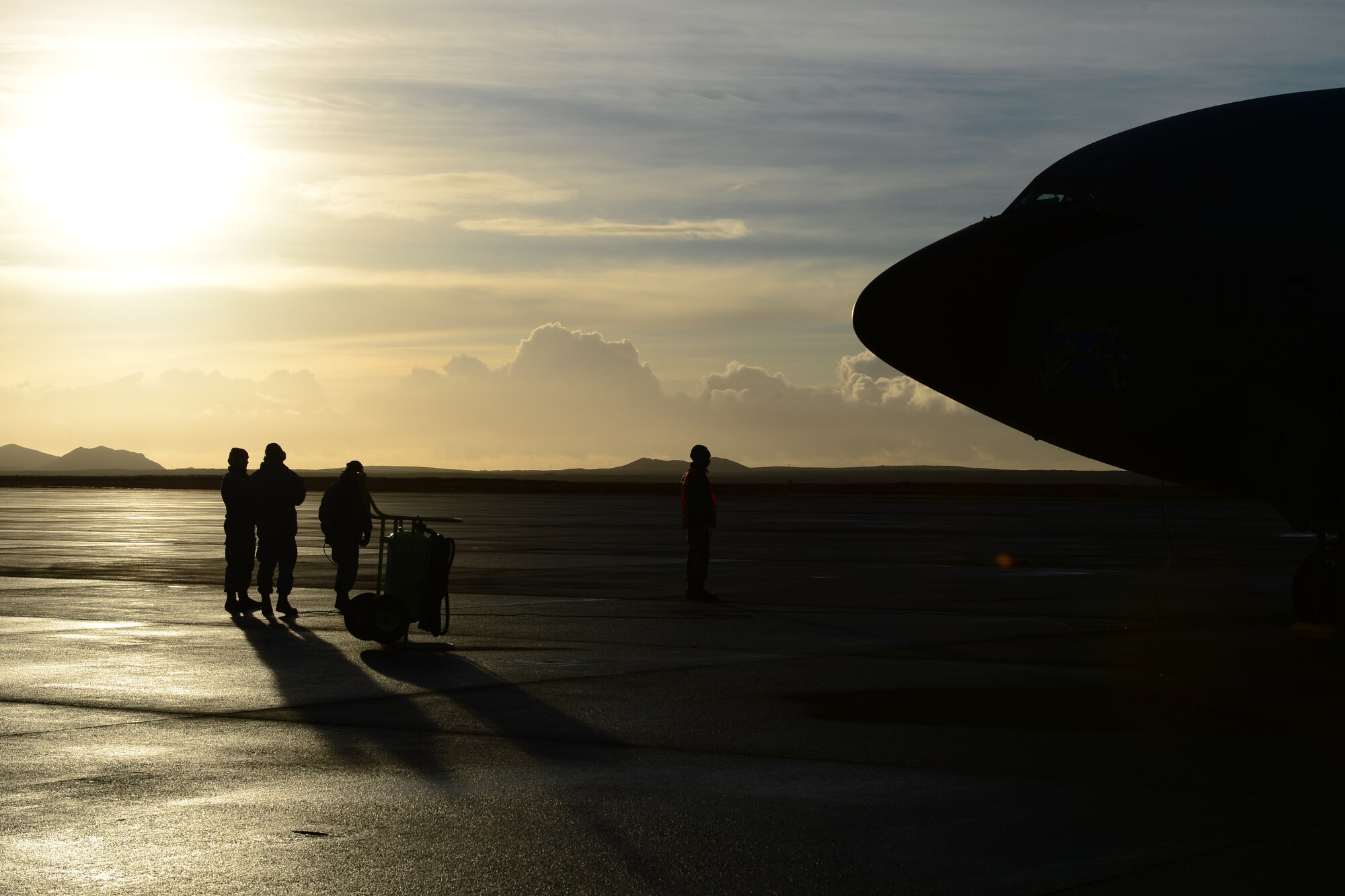Aircrew from the 351st Expeditionary Air Refueling Squadron prepare a KC-135 Stratotanker for take off during a scramble exercise at Keflavik International Airport, Iceland, Nov. 7, 2013. The 48th Air Expeditionary Group has been maintaining the NATO air surveillance and policing mission here since Oct. 28, 2013. The group, which is made up of U.S. Air Force and other North Atlantic Treaty Organization personnel, is a specialized team prepared to ensure Iceland's air sovereignty. (U.S. Air Force photo by Airman 1st Class Dana J. Butler/Released)