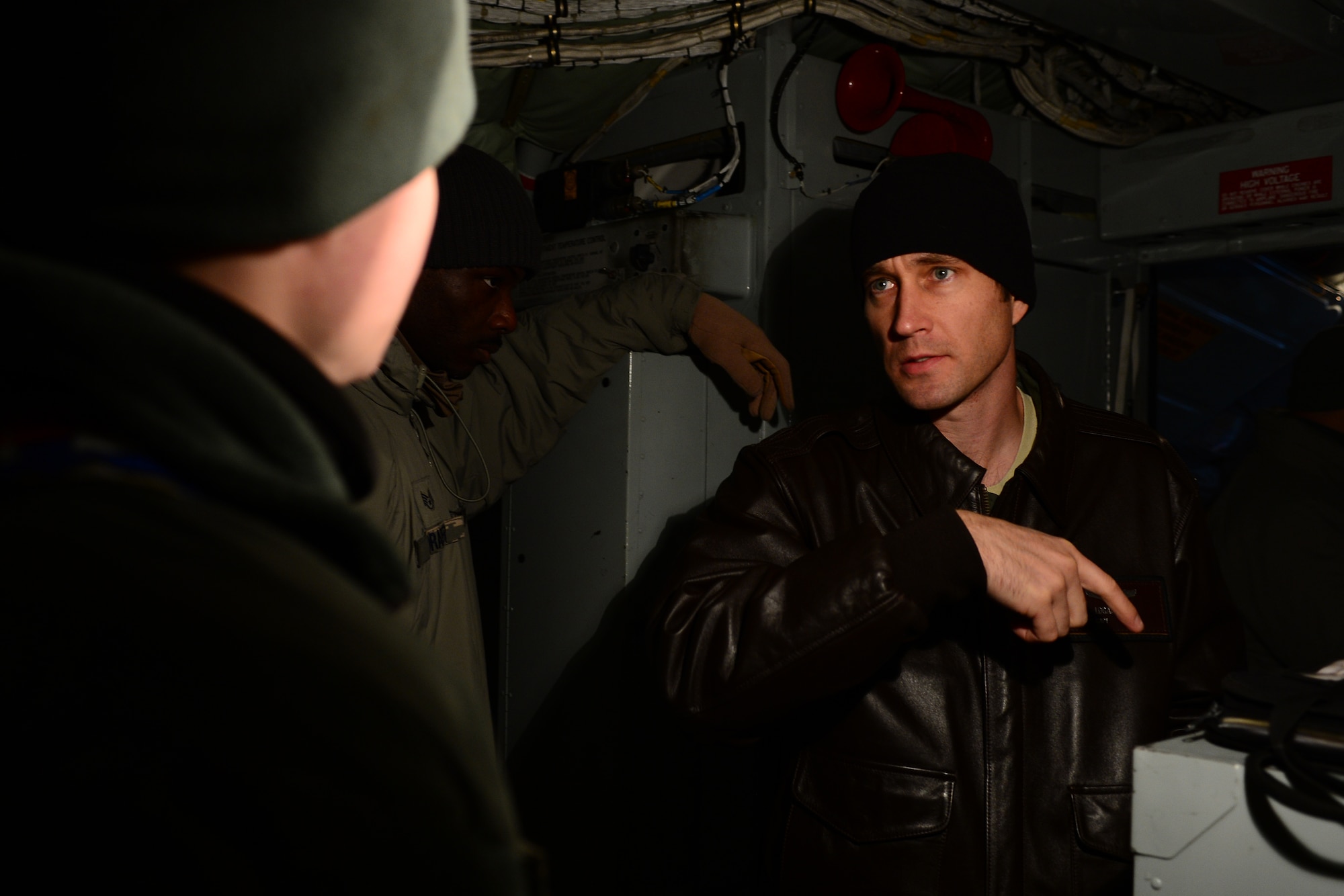 Capt. Logan Smith, 351st Expeditionary Air Refueling Squadron KC-135 Stratotanker pilot, goes over a pre-flight checklist with Staff Sgt. Greg Barker, 351st EARS dedicated crew chief, before taking off from Keflavik International Airport, Iceland, for a scramble exercise Nov. 7, 2013. The 48th Air Expeditionary Group has been maintaining the NATO air policing mission here since Oct. 28, 2013. The group, which is made up of U.S. Air Force and other North Atlantic Treaty Organization personnel, is a specialized team prepared to ensure Iceland's air sovereignty. (U.S. Air Force photo by Airman 1st Class Dana J. Butler/Released)