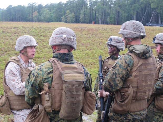 Colonel Ryan P. Heritage speaks to Marine from 2nd Battalion, 9th Marine Regiment, 2nd Marine Division before the Marines begin a live-fire training exercise.