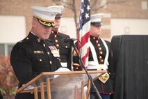 Recruiting Station Lansing Commanding Officer, Major Christopher Buck, reads the Medal of Honor citation for Lt. Sherrod Skinner at a monument dedication Nov,11 in East Lansing, Mich. Lt. Skinner, an East Lansing native, was posthumously awarded the Medal of Honor for actions in Korea, October 26, 1952. 