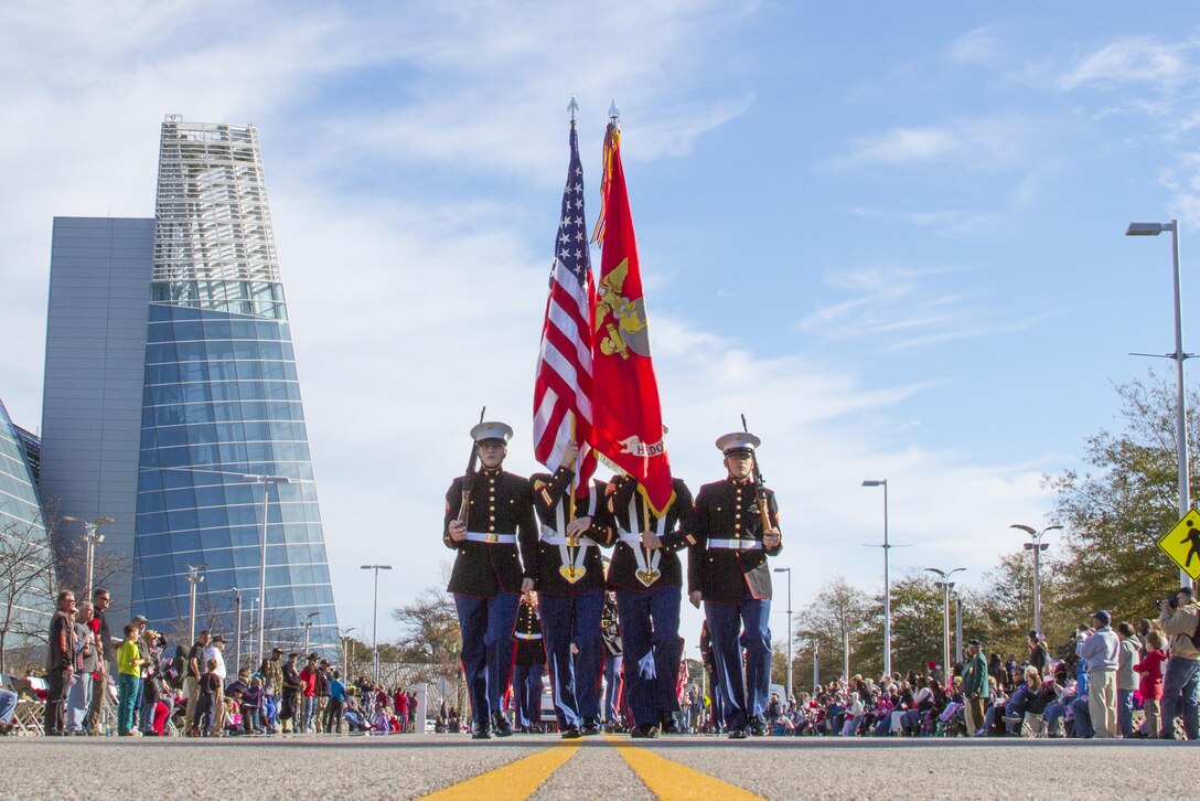 Virginia Beach, Va. (Nov. 11, 2013) – Headquarters and Service Battalion, U.S. Marine Corps Forces Command, provided a color guard and marching platoon for this year’s Virginia Beach Veterans Day Parade. The Hampton Roads Council of Veterans Organizations organized the parade, which has been put on for more than 40 years. “The parade is a way to make sure our patriots know we appreciate their service and their sacrifice,” said Johnny Johnson, a former Marine, Vietnam veteran and board member of the Virginia State Board of Veterans Services. “It is also a way for me to honor the memory of the brave Marines that I served with and who gave their lives so many years ago.”