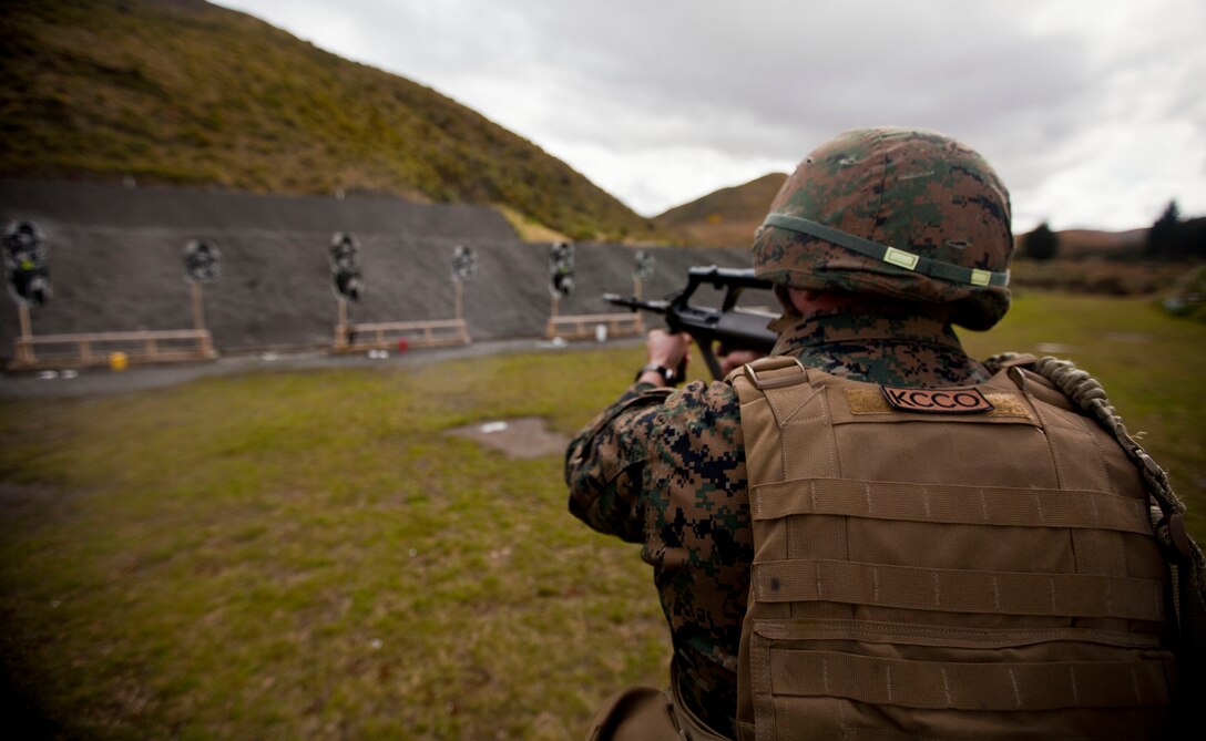 Sgt. Jesse Keffer, military policeman with 1st Law Enforcement Battalion, from Colorado Springs, Colo., assesses and fires upon his target during a familiarization shooting range with the Individual Weapon (IW) Steyr assault rifle during the initial stages of exercise Southern Katipo 2013 at Waiouru Military Camp, New Zealand, Nov. 7. SK13 strengthens military to military relationships and cooperation with partner nations and the New Zealand Defence Force. 