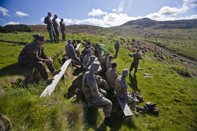 Capt. Phillip Vanderweit, combat engineer officer for 1st Combat Engineer Battalion, from Belhaven, N.C., briefs New Zealand and Papua New Guinean engineers before improvised explosive device identification training during the initial stages of exercise Southern Katipo 2013 aboard Waiouru Military Camp, New Zealand, Nov. 9. SK13 strengthens military-to-military relationships and cooperation with partner nations and the New Zealand Defence Force.