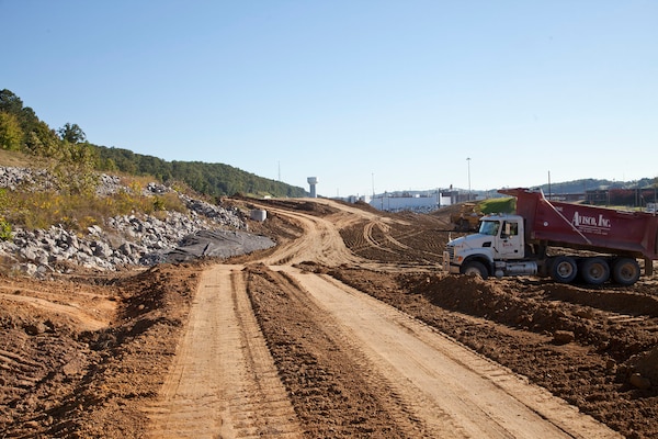 The U.S. Army Corps of Engineers Nashville District grades near the west tie in with the existing Bear Creek Road at the Y-12 National Security Complex in Oak Ridge, Tenn., Oct. 9, 2013. AVISCO is a women-owned small business that has the contract for this project.