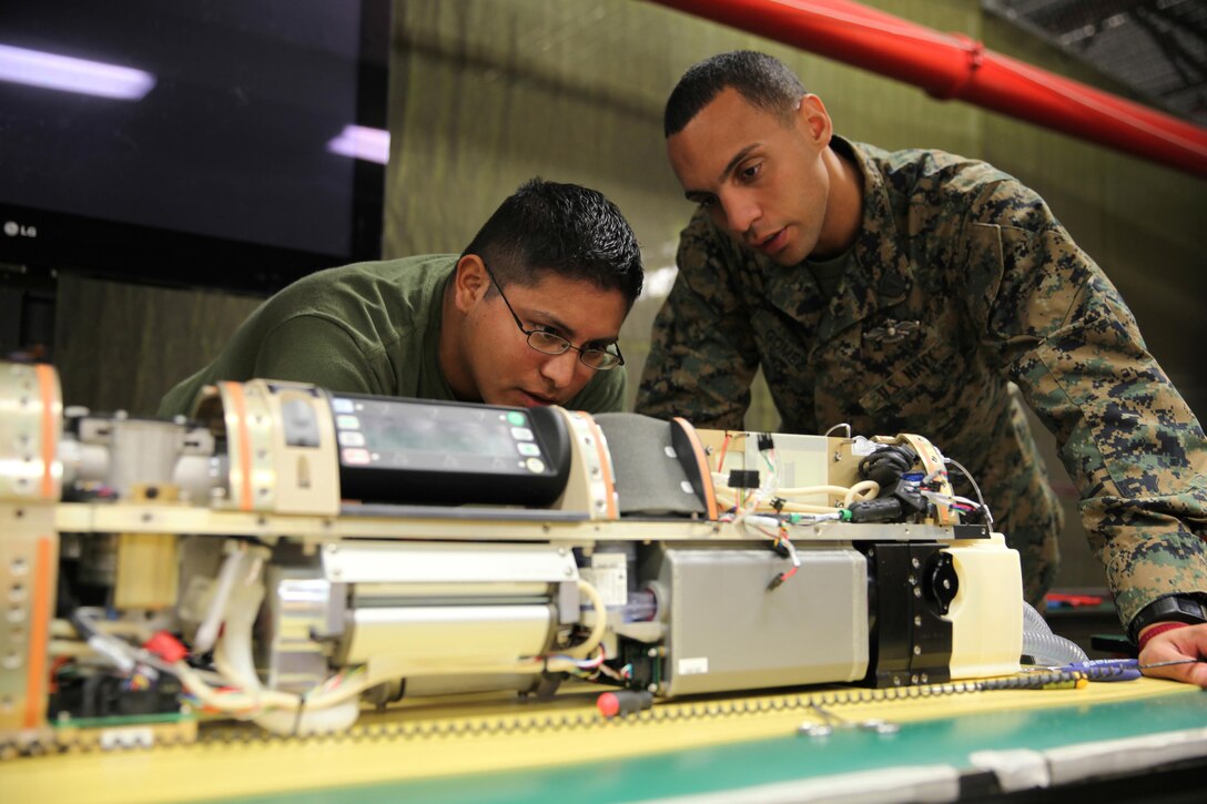 Sailors with Medical Logistics Company, Combat Logistics Regiment 25, 2nd Marine Logistics Group practice changing the air filters on a Portable Patient Transport Life Support System device aboard Camp Lejeune, N.C., Nov. 5, 2013. PPTLSS is scheduled to replace the military’s current life support systems, combining five pieces of essential equipment into a single, lightweight device. 