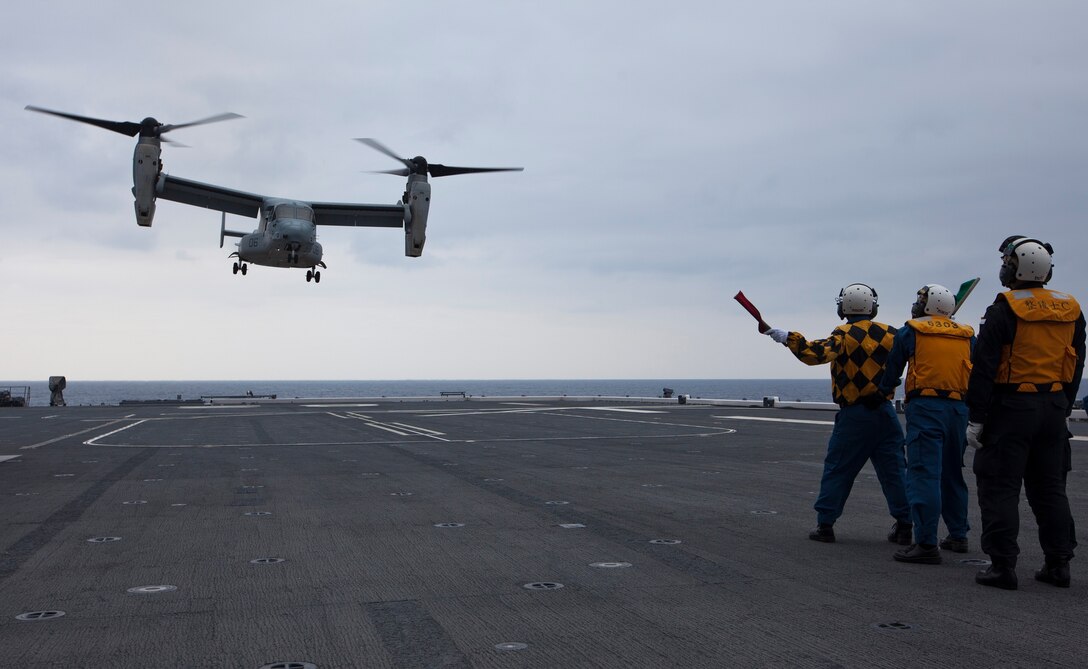 An MV-22B Osprey lands aboard the Japan Maritime Self-Defense Force ship Ise Nov. 12 after taking off from Marine Corps Air Station Futenma in Okinawa only an hour prior. This marks the first time that an MV-22B Osprey landed aboard a JMSDF ship in the Asia-Pacific region. The Osprey is with Marine Medium Tiltrotor Squadron 265, 1st Marine Aircraft Wing, III Marine Expeditionary Force, currently assigned to the 31st Marine Expeditionary Unit. (U.S. Marine Corps photo by Lance Cpl. Matthew S. Myers/Released)