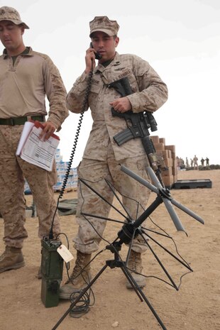 CAMP BUEHRING, KUWAIT (Nov. 1, 2013) A U.S. Marine with 13th Marine Expeditionary Unit conducts a radio check aboard Camp Buehring, Kuwait Nov. 1, 2013. The 13th MEU is deployed with the Boxer Amphibious Ready Group as a theater reserve and crisis response force throughout the U.S. 5th Fleet area of responsibility. (U.S. Marine Corps photo by Cpl. David Gonzalez, 13th Marine Expeditionary Unit Combat Camera/Released)