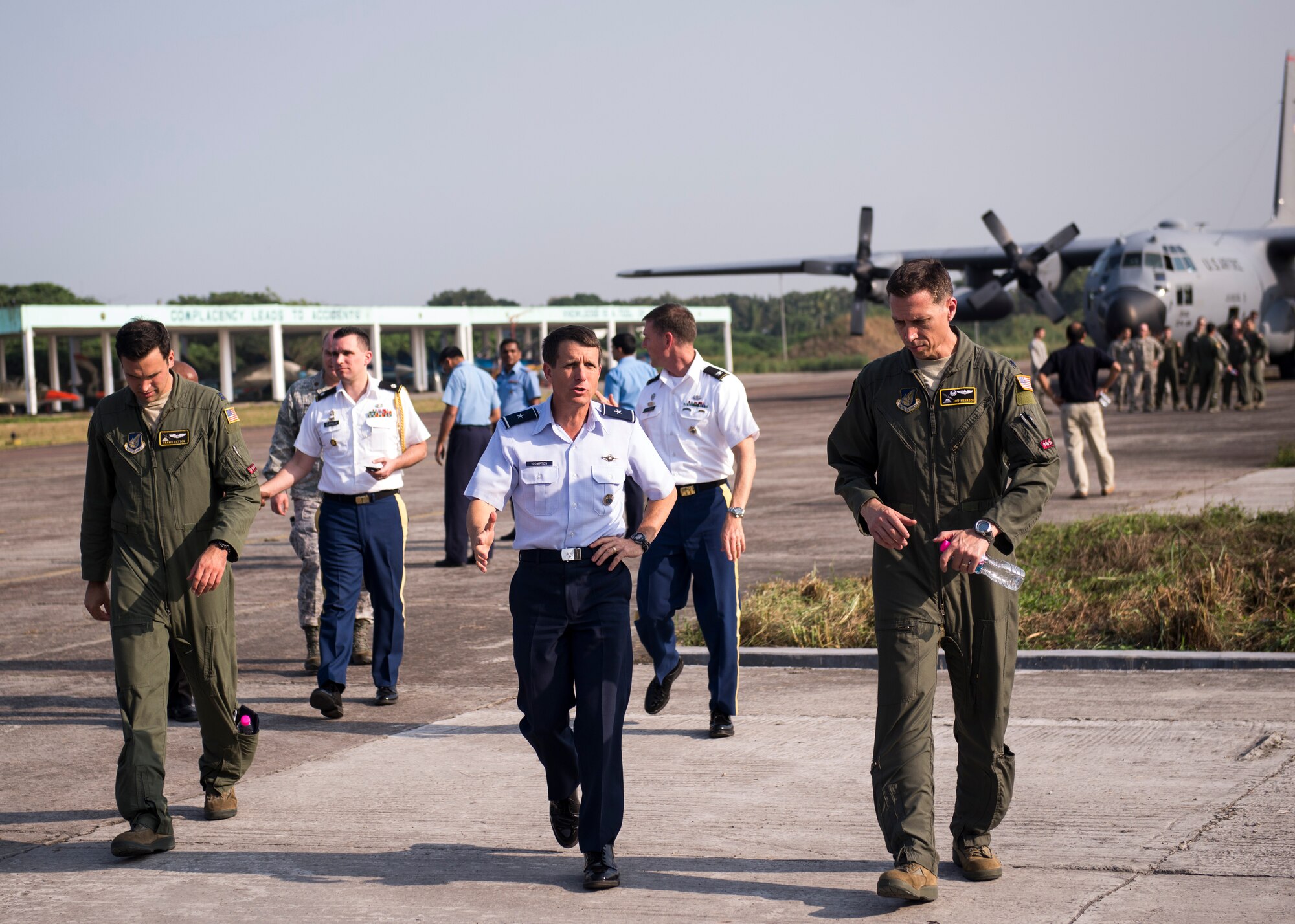 Brig. Gen. Mike Compton, U.S. Pacific Command Deputy J5 Director, meets with Lt. Col. Jeff Menasco, 36th Airlift Squadron commander, prior to exercise Cope South at Bangabandhu Air Base, Bangladesh, Nov. 7, 2013. The exercise is designed to cultivate common bonds, foster goodwill, and improve readiness and compatibility between members of the Bangladesh and U.S. Air Force. (U.S. Air Force photo by Captain Raymond Geoffroy/Released)