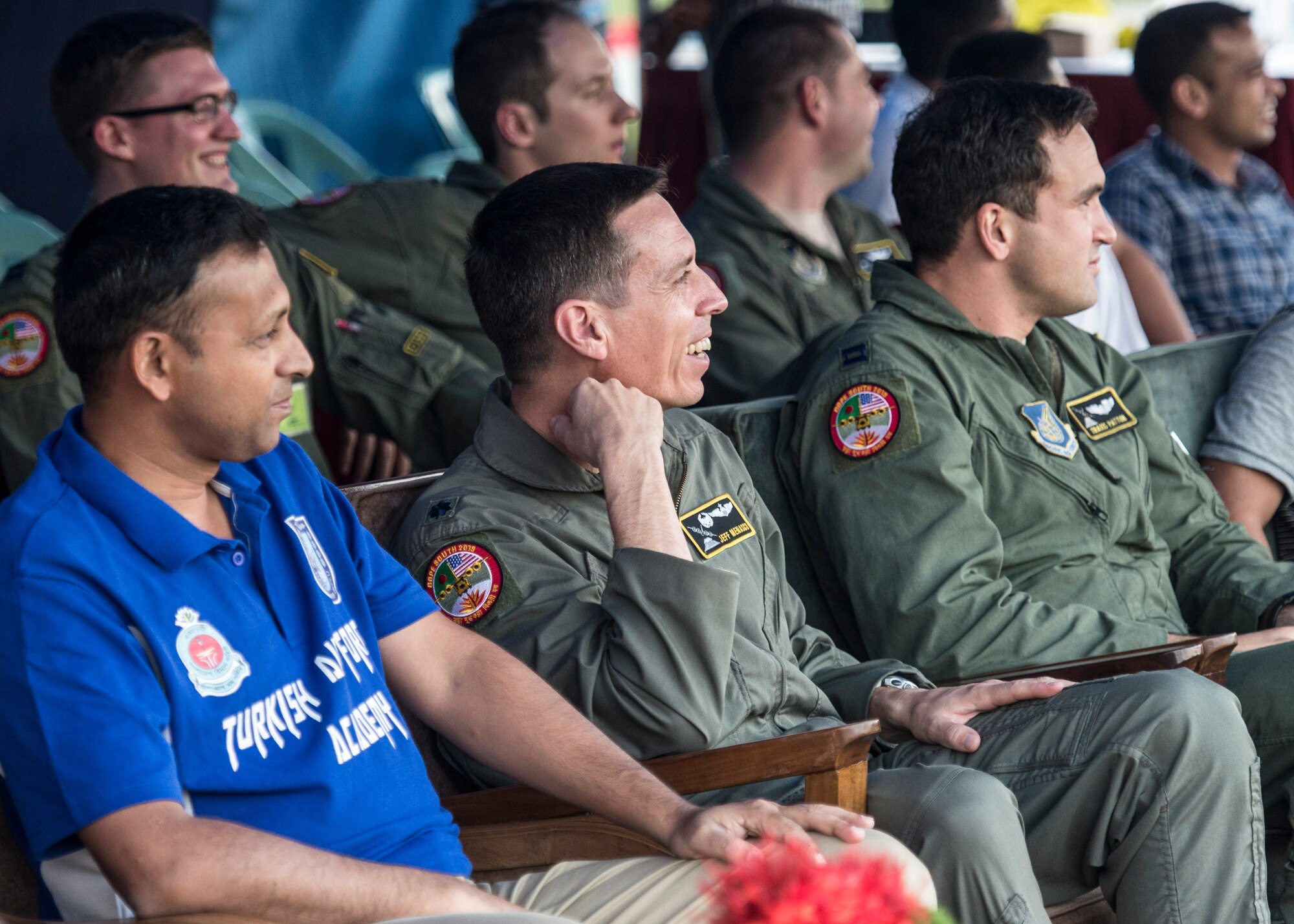 Lt. Col Jeff Menasco, 36th Airlift Squadron commander, watches as Airmen from Yokota Air Base, Japan, play a friendly match against the official Bangladesh Air Force soccer team at Bangabandhu Air Base, Bangladesh, Nov. 8, 2013. Menasco leads approximately 80 U.S. Airmen participating in exercise Cope South in Bangladesh. (U.S. Air Force photo by Captain Raymond Geoffroy/Released)