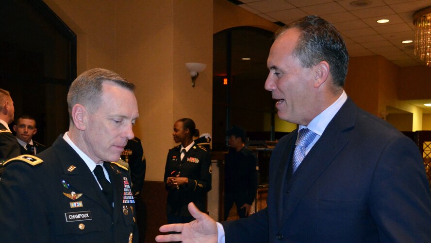 OSAN AB, Republic of Korea – Riki Ellison (left), chairman and founder of the non-profit Missile Defense Advocacy Alliance, speaks with Lt. Gen. Bernard Champoux, commanding general of Eighth Army, prior to the kickoff of the second annual Peninsula Missile Defender of the Year Ball held in Seoul, Nov. 8. (U.S. Army photo by Spc. Shawn Denham, 35th ADA Public Affairs)