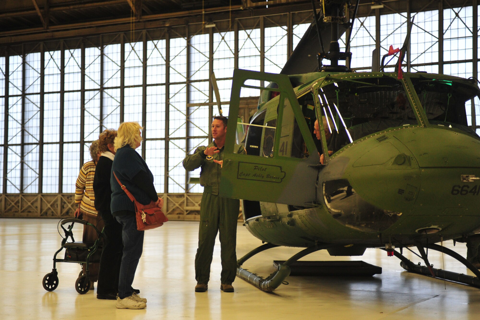 Members of the community interact with members of Team Fairchild during the base’s Veterans Day event held in Hangar 2 at Fairchild Air Force Base, Wash., Nov. 7, 2013. (U.S. Air Force photo by Senior Airman Taylor Curry/Released)