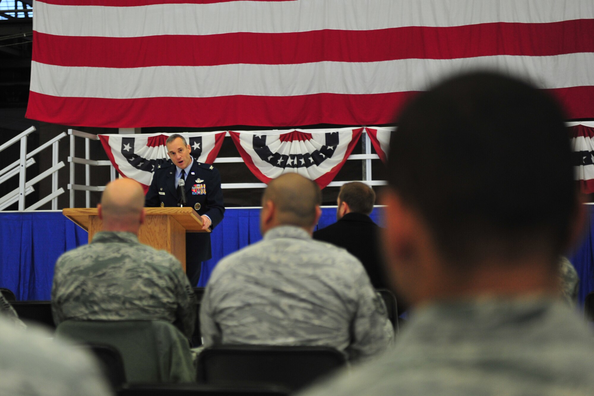 Col. Brian Newberry, 92nd Air Refueling Wing commander, speaks during the base’s Veterans Day event held in Hangar 2 at Fairchild Air Force Base, Wash., Nov. 7, 2013. (U.S. Air Force photo by Senior Airman Taylor Curry/Released)