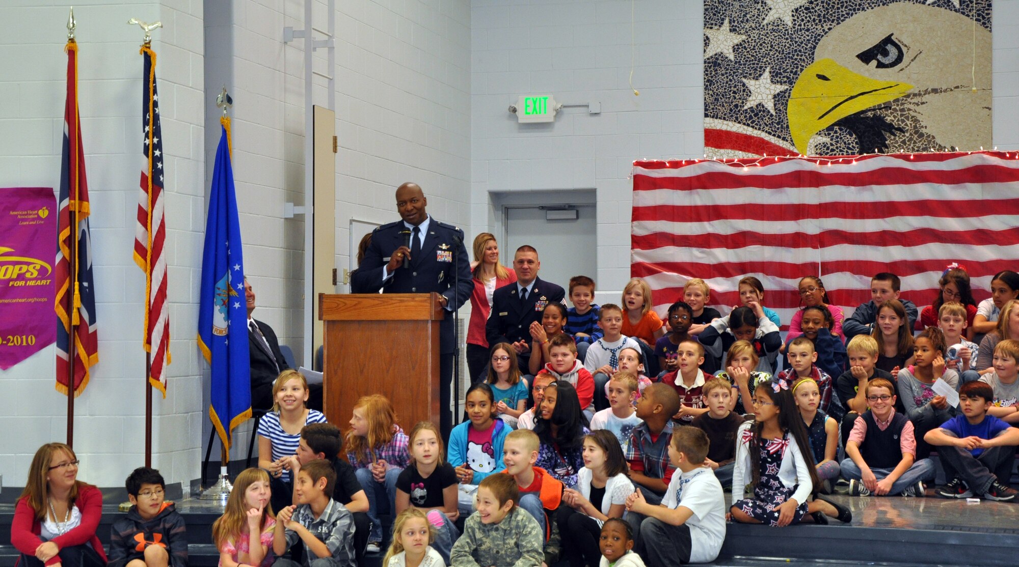 131111-F-CP692-005 Col. Carl Jones, 90th Missile Wing vice commander, talks to children and parents during a Veterans Day Ceremony at Freedom Elementary School Nov. 11. Jones spoke on the importance of military families to Airman and how they serve their country as much as the Airmen. (U.S. Air Force photo by 1st Lt. Eydie Sakura)